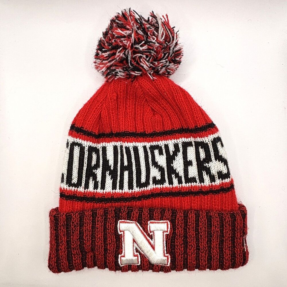 New Era Nebraska Cornhuskers Red Black White Pom Beanie Knit Cuffed Hat